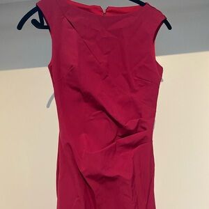 Le Chateau cranberry red dress with slit at the neck line.